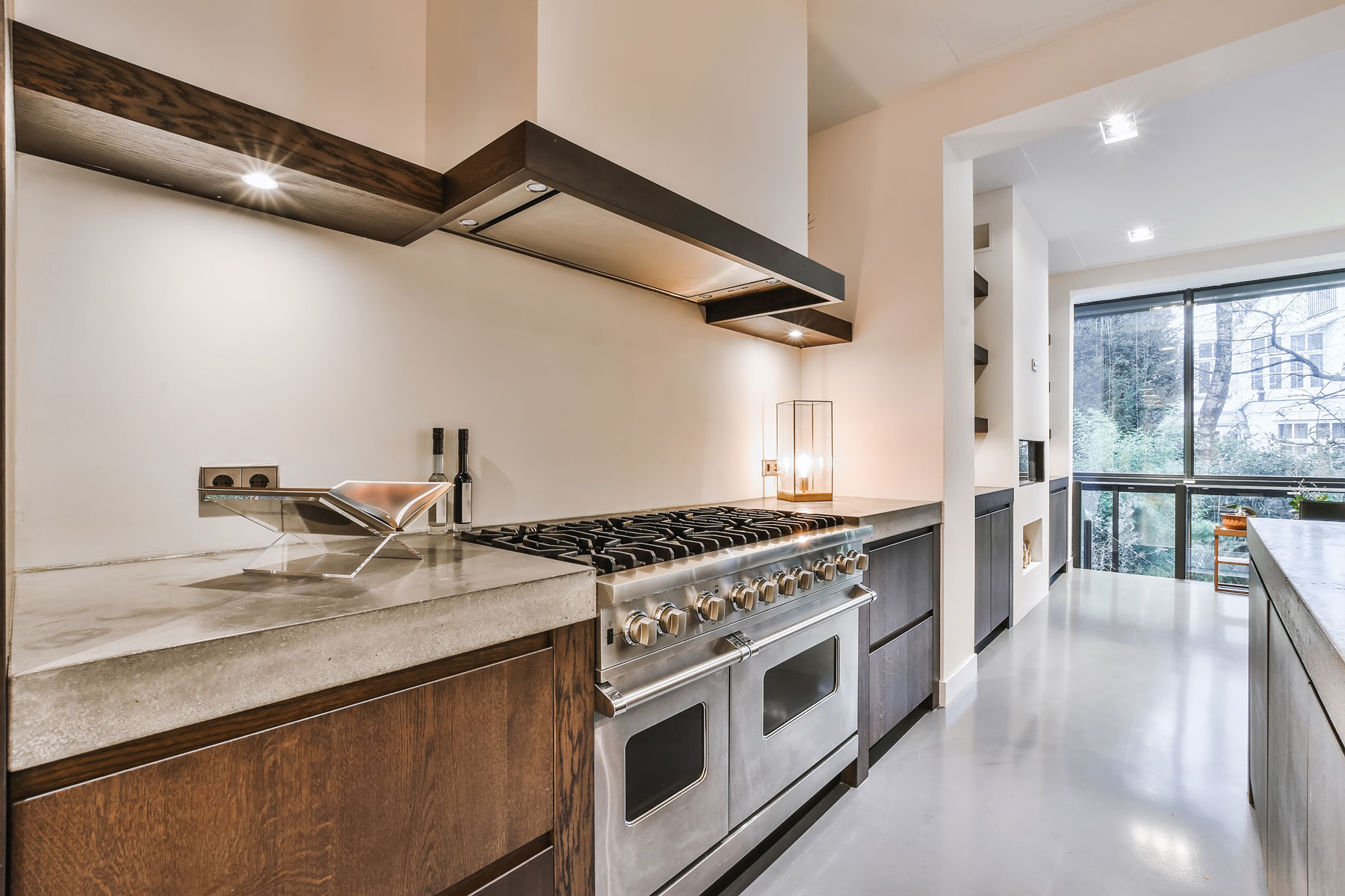 Modern minimalist kitchen design Montreal with clean lines and neutral tones